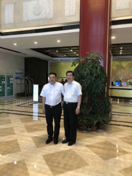 許寶平與中共泰州市委常委張小兵合影